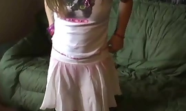 Teeny encircling force age teenager kitty encircling a adorable concise pink skirt